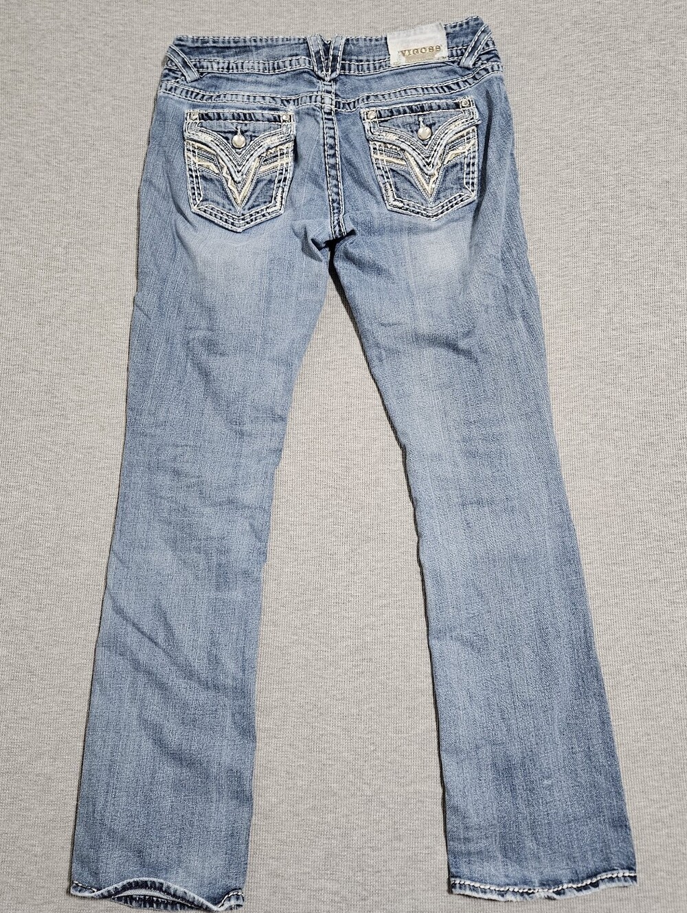 Vigoss blue bootcut jeans with silver detailing batazzle on pockets white stitch